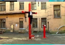 В Риге избиты авторы инсталляции с "распятым Путиным"