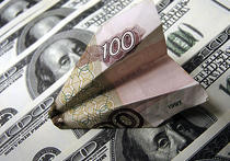 Медведев связал падение рубля с курсами юаня и тенге