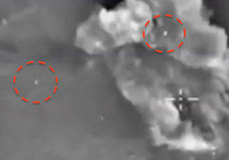 Странное видео было снято в Сирии в момент бомбардировки беспилотником ВКС РФ позиций боевиков запрещенной в России террористической группировки "Исламское государство"