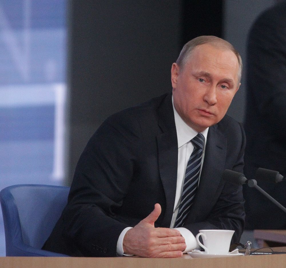 Кадры с ежегодной пресс-конференции президента РФ Владимира Путина