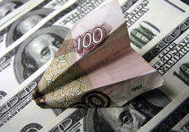 Национальная российская валюта продолжила своё падение к евро и доллару в понедельник утром, на фоне новостей с нефтяных рынков