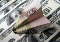 Курс американской валюты к российскому рублю вновь вырос в среду, пробив уровень 80
