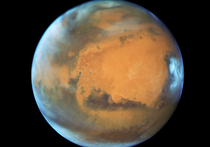 Воспользовавшись сближением Земли и Марса, космический телескоп Hubble сделал снимок Красной планеты с минимального расстояния