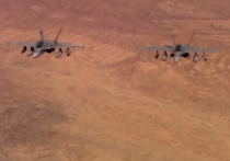 По данным CNN, в пятницу на границе Иордании и Сирии американские истребители FA-18 пытались связаться с российскими летчиками, во время выполнения операции ВКС РФ