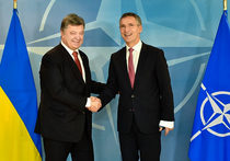 Президент Украины Петр Порошенко заявил, что у армии его страны есть реальный опыт ведения войны с современной российской армией, и Киев готов поделиться своими "знаниями" с партнерами по НАТО