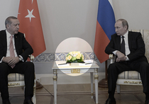 Журналисты обратили особое внимание на букет цветов, который был на столе между президентом Турции Эрдоганом и главой России Владимиры Путиным