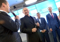 Президент Владимир Путин и премьер Дмитрий Медведев после выборов приехали в штаб ЕР