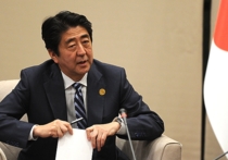 Россия после присоединения Крыма нарушила статус-кво и вынудила Токио присоединиться  к санкциям, заявил Абэ в японском парламенте
