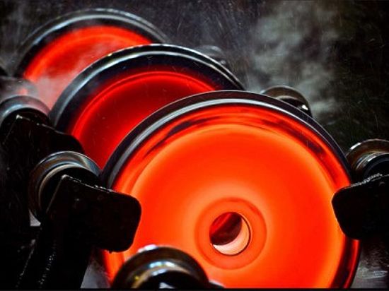Металлоинвест и ОМК подписали договор на поставку стальных заготовок для производства ж/д колес