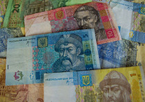 Без спасительного транша от МВФ в 5 млрд долларов Украина скатится в дефолт и обрушит курс гривны, пугают в Нацбанке страны