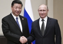 Президент России Владимир Путин начал свой визит в Астану на саммит Шанхайской организации сотрудничества (ШОС) со встречи с председателем КНР Си Цзиньпином