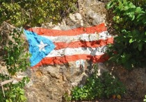 Губернатор Пуэрто-Рико Рикардо Россельо обещает превратить тропический остров в 51-й штат в составе США после того, как пуэрториканцы проголосовали на референдуме в пользу присоединения к супердержаве