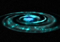 Две сверхмассивных черных дыры, одна из которых вращается вокруг другой, обнаружили ученые из Университета Нью-Мексико с помощью радиоинтерферометра  под названием Very Long Baseline Array (VLBA)