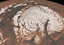 Группа исследователей из Франции и США высказала предположение, что в темное время суток на Марсе можно наблюдать снежные бури