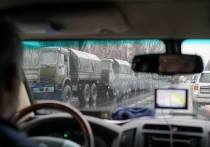ОБСЕ показала фото техники и вооруженных людей на улицах Луганска
