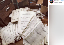 Сотни документов с личными данными и фотографиями граждан были найдены в заброшенном здании полиции, рядом с новеньким зданием ОМВД по району «Академический»