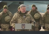 СМИ, а также пользователи соцсетей считают, что в Facebook Петра Порошенко появилась фотография с украинским солдатом, у которого на форме видна эмблема танковой дивизии СС "Мертвая голова" - череп со скрещенными костями