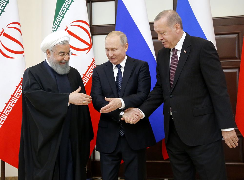 Путин в Сочи развеселил Рухани и Эрдогана