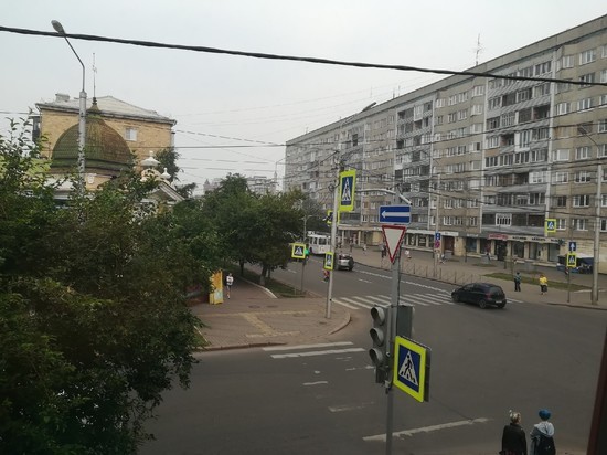 Красноярск снова заволокло смогом с запахом гари