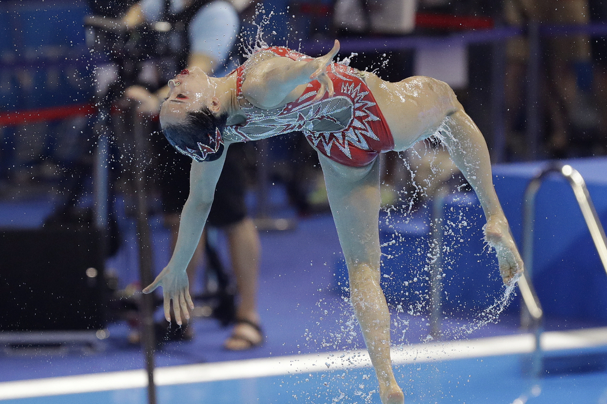 Российские спортсмены доминируют в синхронном плавании, китайские - в прыжках в воду