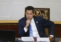Государственная прокуратура Венесуэлы открыла расследование в отношении Хуана Гуайдо после того, как в эфире государственного телевидения были представлены фотографии «временного президента» в компании двух колумбийских наркобаронами