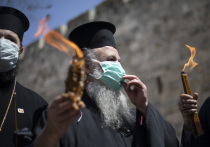 Второй год подряд Схождение Благодатного огня в Иерусалиме, которое приходится на Великую субботу накануне Пасхи, будет происходить в чрезвычайных условиях