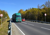 В Республике Бурятия свыше 65 километров автомобильной трассы Р-258 «Байкал» защитили слоями износа