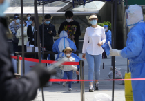 Власти Пекина продолжают наращивать количество больничных мест в связи с новым всплеском заболеваемости коронавирусом в китайской столице