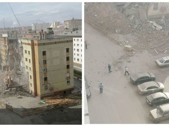 В Норильске Красноярского края во время сноса аварийного дома стена едва не придавила прохожих и автомобиль