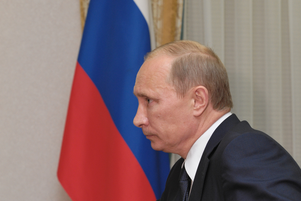 Путин с боку фото