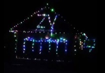 Жители села Урульги к Новому году украсили дом гирляндами в поддержку участников специальной военной операции на Украине (СВО)