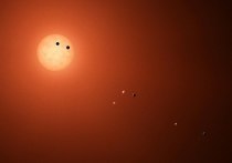 Ученые из Швейцарии высказали предположение, что вспышки звезды TRAPPIST-1 поддерживают длительную геологическую активность на каменистых планетах, находящихся на ее орбите