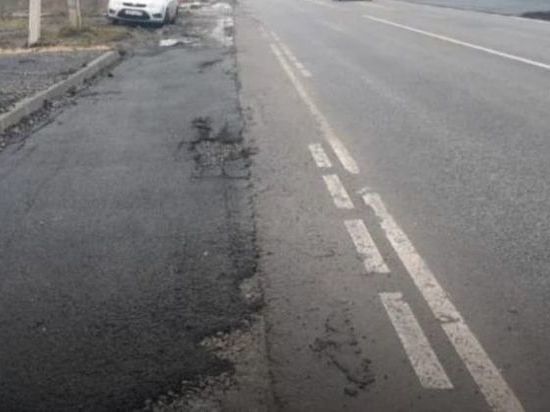 В Сосновском районе разрушается недавно отремонтированная дорога