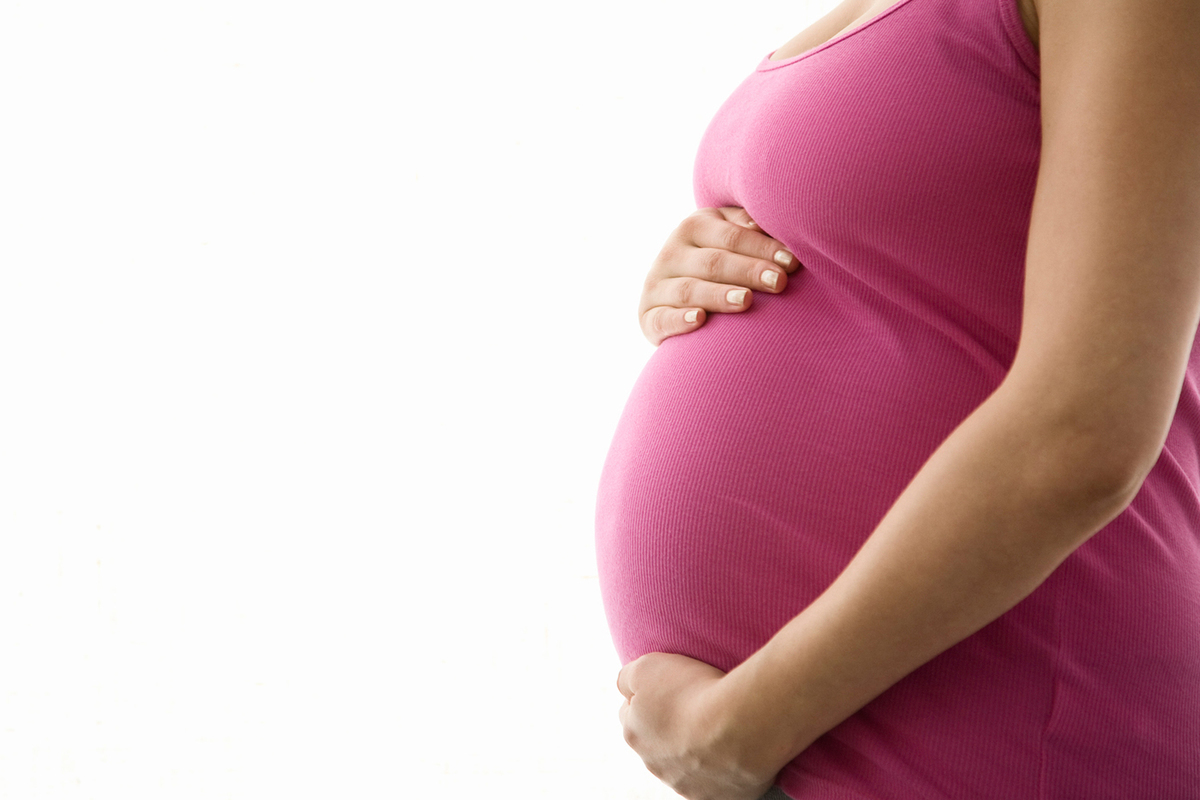Беременная женщина вид сбоку