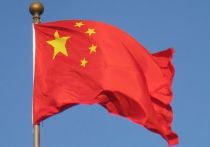 В китайском министерстве иностранных дел раскритиковали практику установки вывесок с украинским флагом рядом с посольствами западных государств, сообщает kyodonews