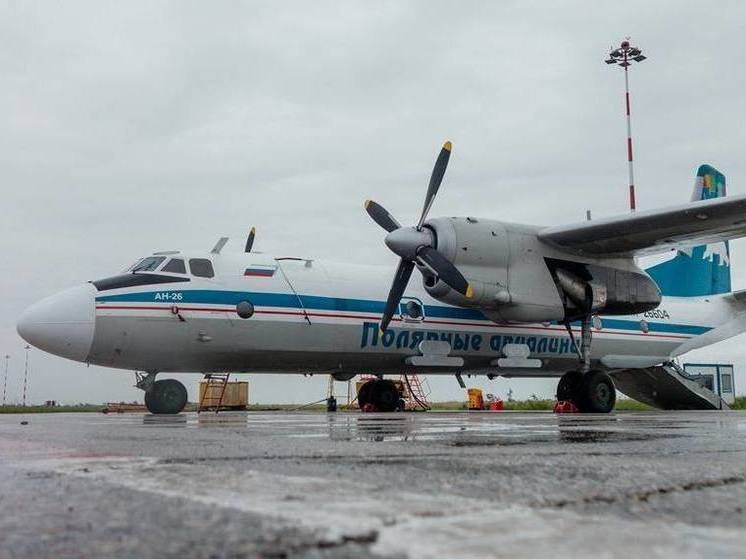 Самолет Ан-26 «Атмосфера»  выполняет работы по снижению класса пожароопасности