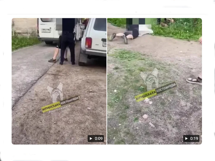 Полицейские положили на землю двух молодых людей с неадекватным поведением