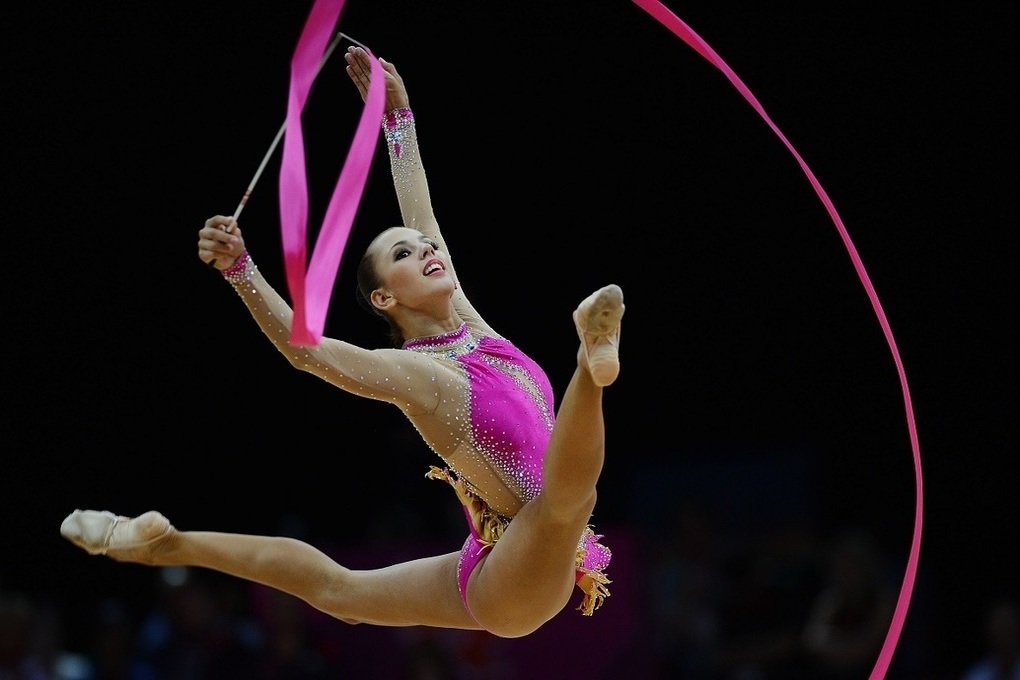 Дмитриева заявила,что российские гимнастки не должны прекращать тренироваться