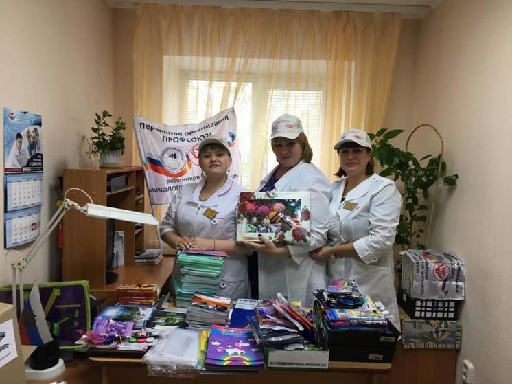 Омичи помогают подготовить школьников ДНР к учебному году