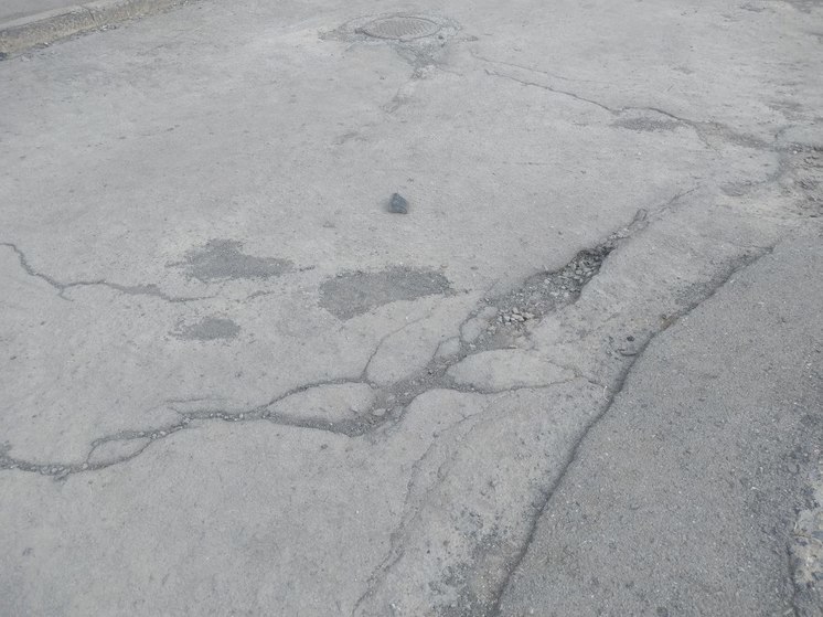 В Муравленко бизнесмен и коммунальщик заплатили юному велосипедисту 300 тысяч за сломанные зубы на дырявом тротуаре