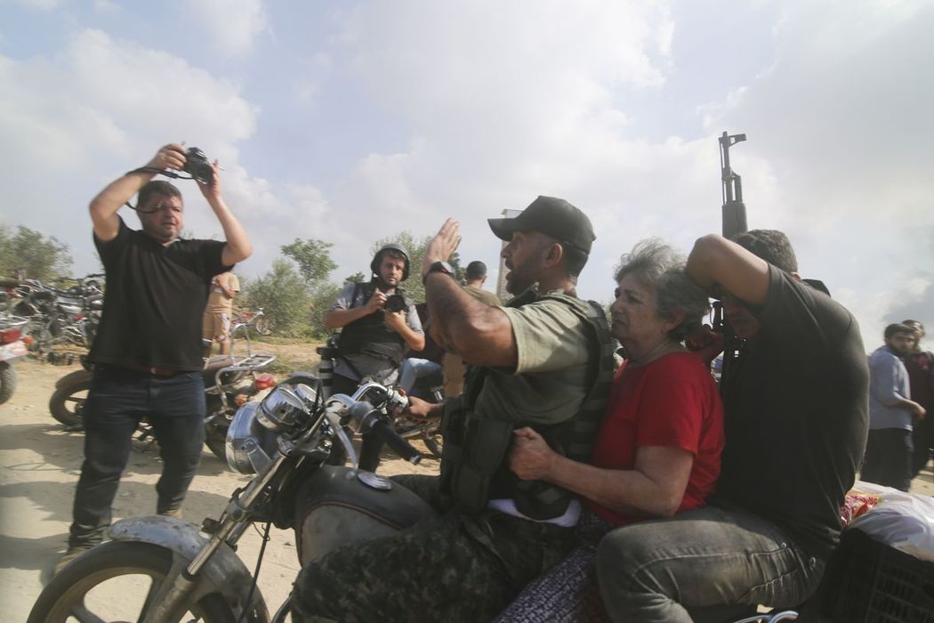 Captured Israelis, Hamas militants on tanks, flying rockets: dramatic images of the Israeli conflict