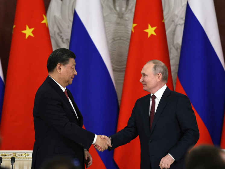 Ушаков назвал главные темы переговоров Путина и Си Цзиньпина в Китае