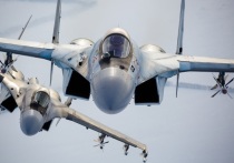 Министерство обороны РФ показало видео взлета истребителей Су-35С, которая сопровождали Борт номер один в ходе поездки президента России Владимира Путина в Объединенные Арабские Эмираты (ОАЭ) и Саудовскую Аравию