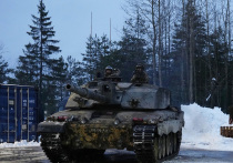На обложке разместили мрачное фото одинокого украинского танка

