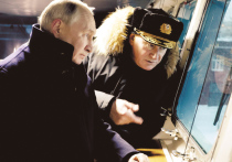 На церемонии в Архангельске он появился в шерстяном пальто и без шапки