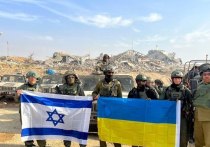 Украинское издание Klymenko Time опубликовало фото из сектора Газа с украинским и израильским флагами