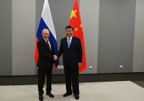 Президент РФ Владимир Путин и председатель Китайской Народной Республики Си Цзиньпин поздравили друг друга с Новым годом