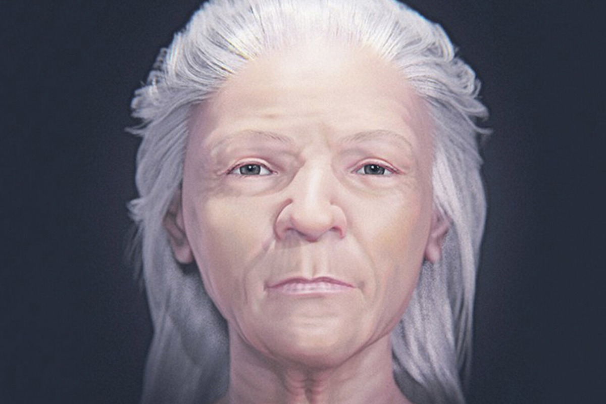 Scientists have reconstructed the face of a vampire woman buried with a brick in her mouth.