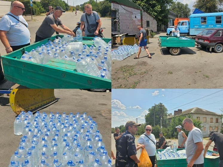 Под вражеским огнем: жителям Таврийска привезли бутилированную питьевую воду