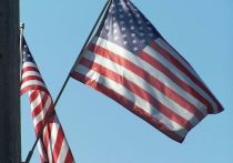 Американский парламент планирует отправиться на каникулы, хотя напряженная геополитическая обстановка требует беспрестанного внимания законотворцев